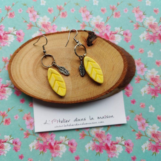 Boucles d'oreilles plumes jaunes