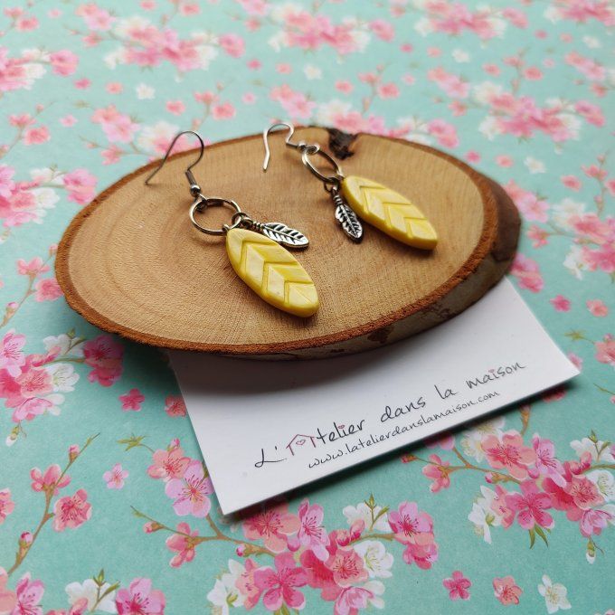 Boucles d'oreilles plumes jaunes