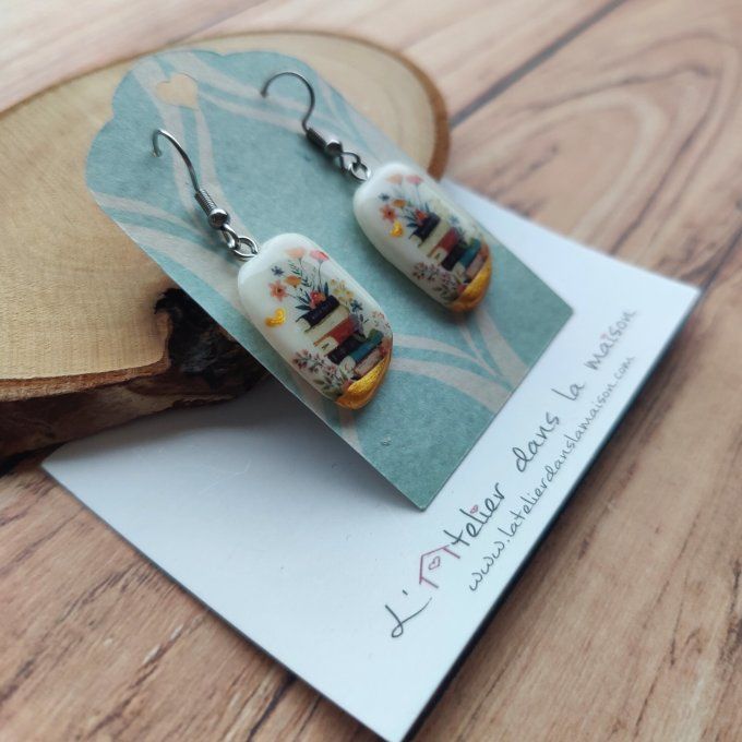 boucles d'oreilles maitresse livres lecture