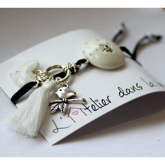 Bracelet médaillon blanc avec coeur et oiseau