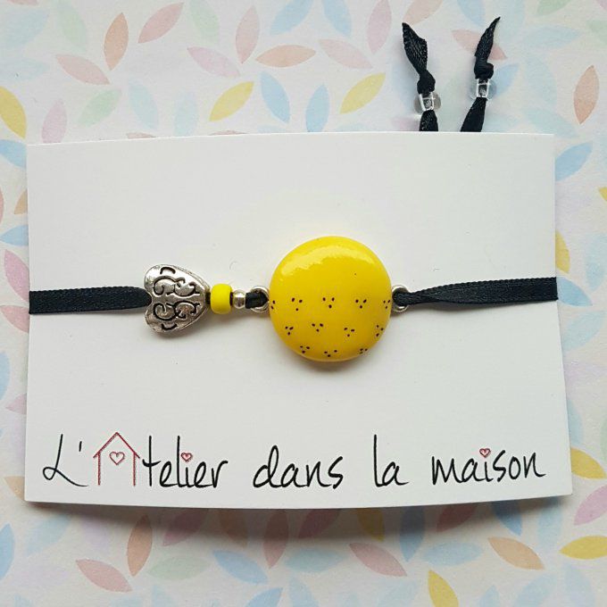 bracelet jaune et pois noirs 