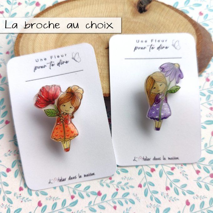 broche et message cadeau fleur