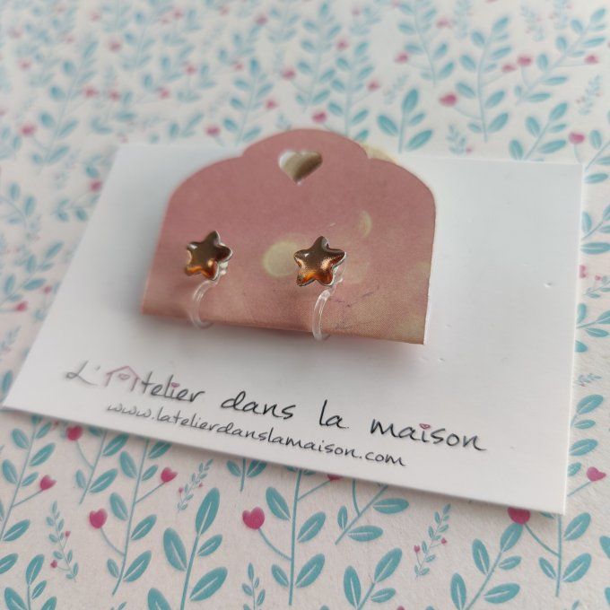 Boucles d'oreilles sans perçage étoile reflets dorés