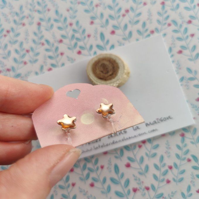 Boucles d'oreilles sans perçage étoile reflets dorés