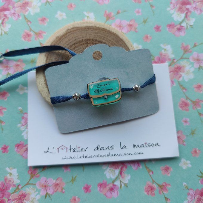 Le bracelet cartable turquoise Super Maîtresse