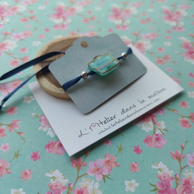 Le bracelet cartable turquoise Super Maîtresse