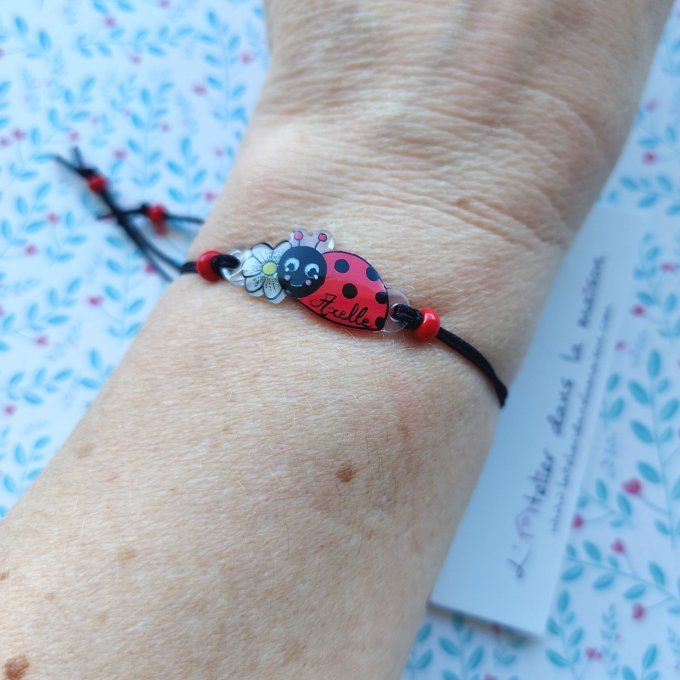 Bracelet réglable avec prénom fleur ou coccinelle