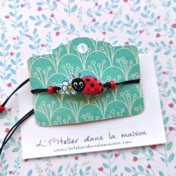 Bracelet réglable avec prénom fleur ou coccinelle