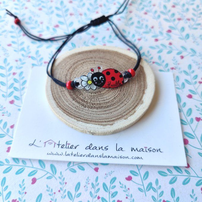 Bracelet réglable avec prénom fleur ou coccinelle