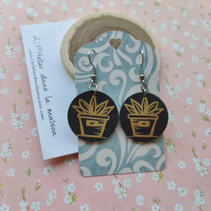 Boucles d'oreilles rondes noires et dorées en simili cuir plante